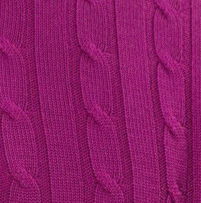 A close-up of an Impulso 1/4 Zip Cable Knit Sweater with Italian virgin wool in a lush purple hue.