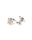 Two Enzone silver cufflinks with square shapes and concentric circle designs lie on a white surface.