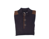 The Polo Sweater by Fashion International is designed with a high collar, three front buttons, and folded style in dark fabric. It also features distinct brown shoulder patches.