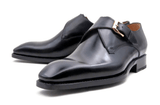 A pair of Edward Sr. black leather monk shoes with buckle by Ugo Vasare.