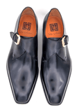 A pair of black Edward Sr. monk shoes with gold buckles featuring Goodyear welt construction by Ugo Vasare.