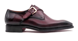 An Edward Sr. men's burgundy leather monk shoe with a buckle and Goodyear welt construction by Ugo Vasare.