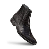 A pair of Belucci black crocodile skin boots by Mezlan on a white background.