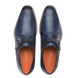 A pair of Mezlan Artisan Welt Monk Strap shoes with orange soles and buckle closure.