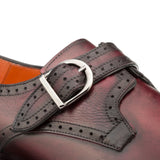 A versatile Mezlan Artisan Welt Monk Strap with a buckle closure.