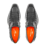 A pair of black Mezlan Crocodile Plain Toe Slip-On shoes with orange soles that exudes a striking blend of texture.