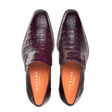 A pair of Mezlan Crocodile Plain Toe Slip-On loafers.